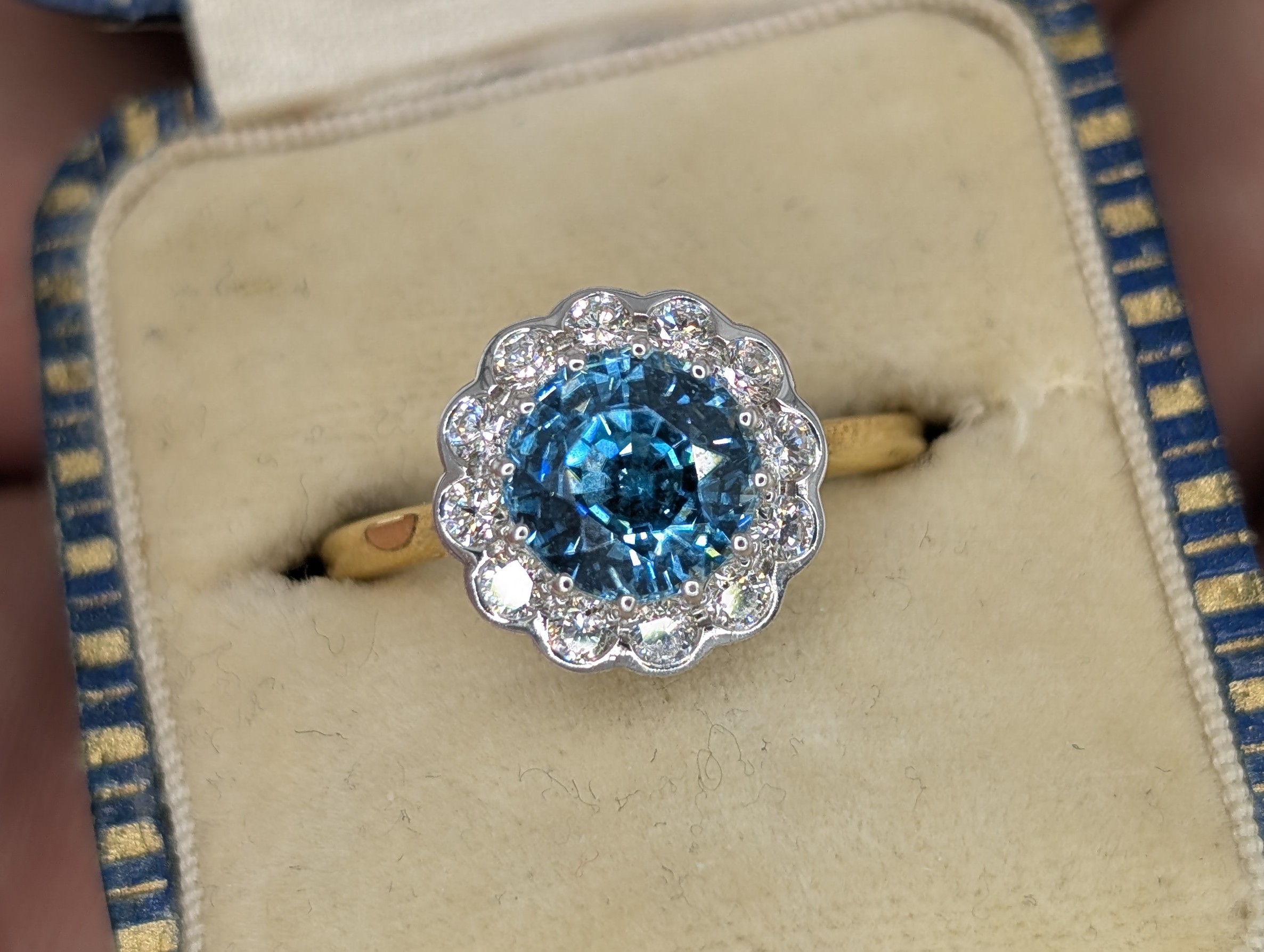 Finished blue zircon and diamond bespoke ring