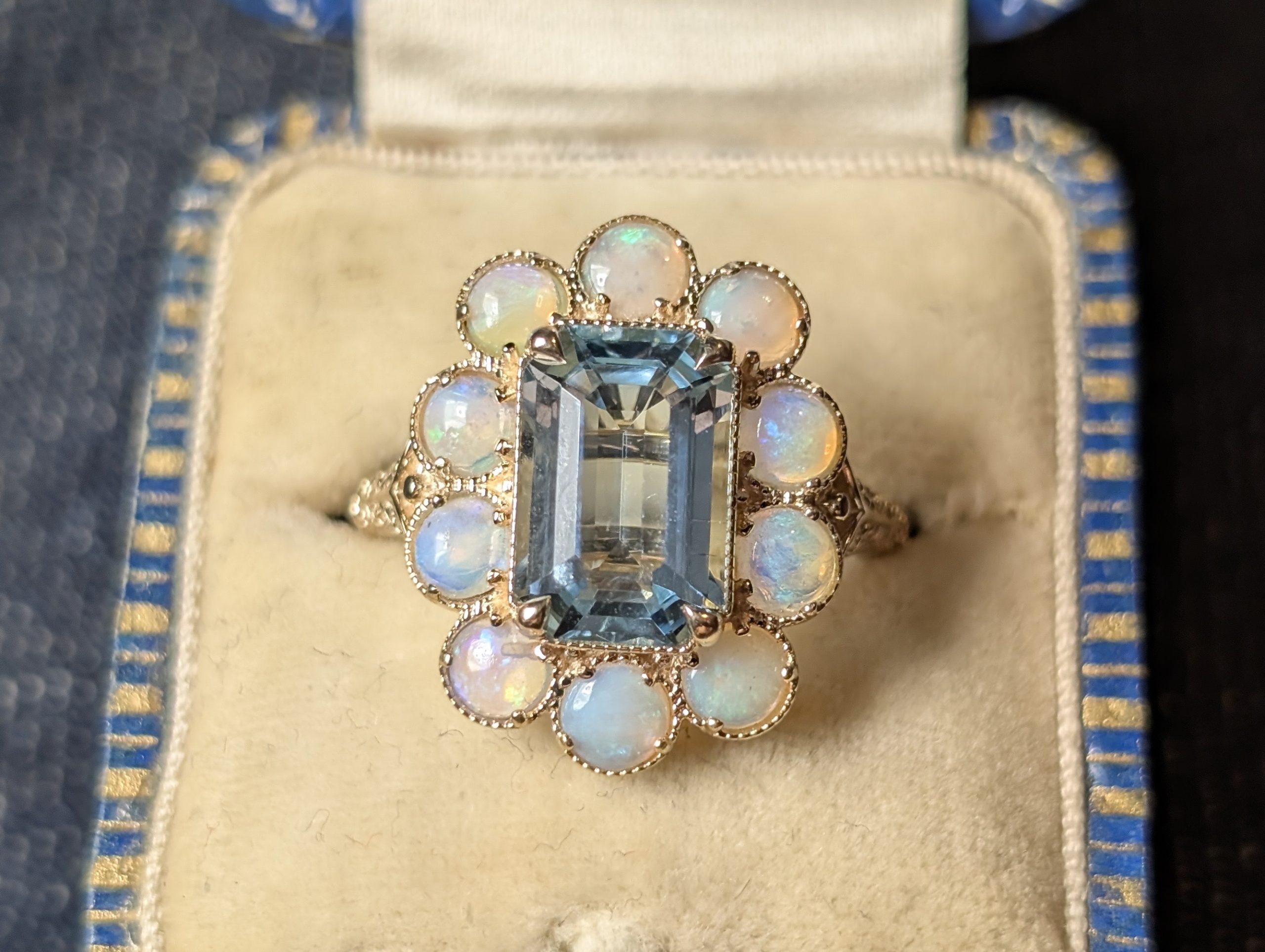 Finished aquamarine and opal bespoke ring